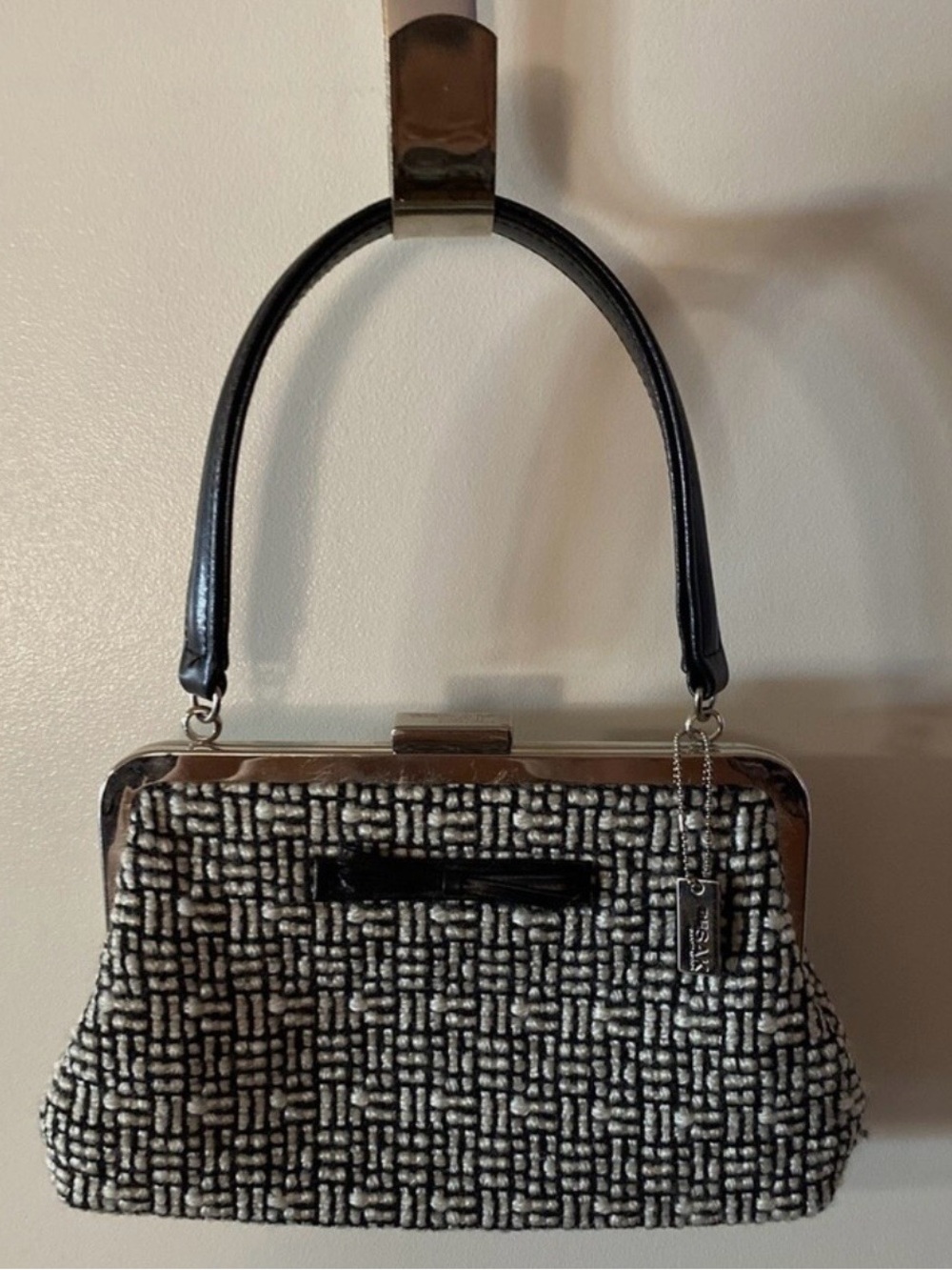 The Sak Vintage inspired Black and White Woven Frame Clutch with Top Handle